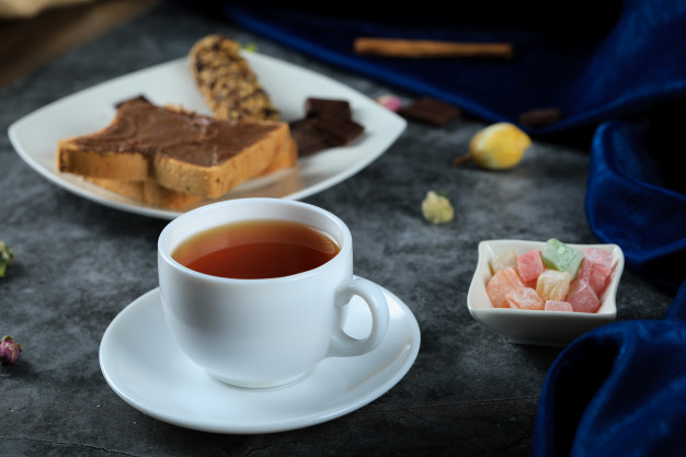white-cup-tea-with-chocolate-toast-bread_114579-6342.jpg