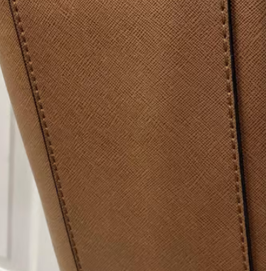 Guess backpack real vs fake comparison. How to spot fake Guess bag 