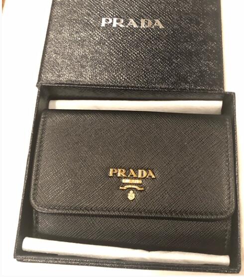 Amazon.com: Prada Womens Saffiano Leather Rosso Red Snap Trifold Wallet :  Clothing, Shoes & Jewelry